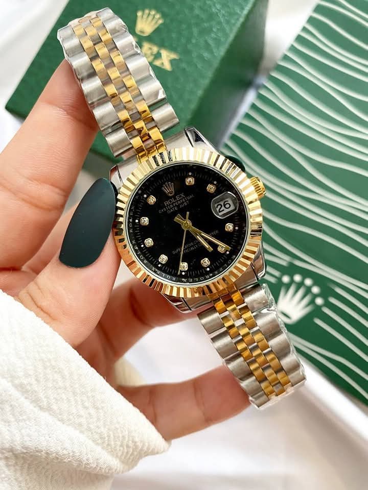 ساعة Rolex Lady-Datejust  شروط لون سيلفر_جولد ميناء سيلفر و اسود وجولد