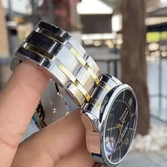 ساعة Tissot Stainless Steel Day-Date لون سيلفر ومطعم ميناء اسود وابيض