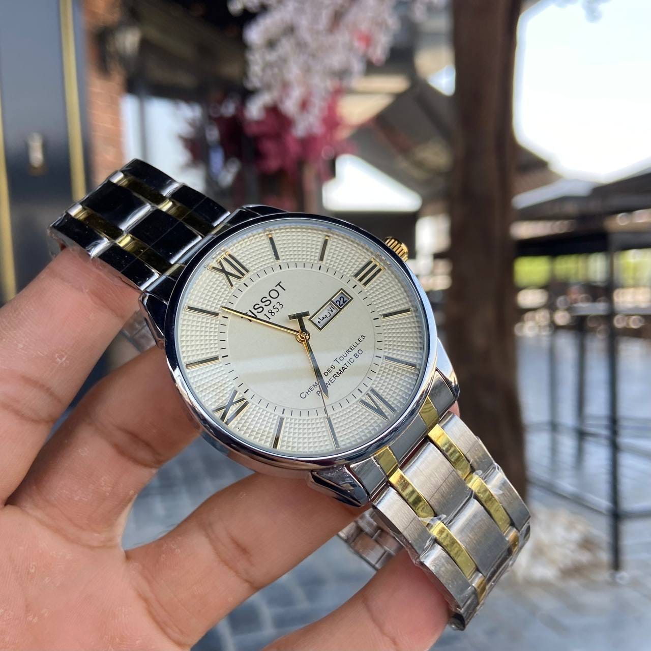 ساعة Tissot Stainless Steel Day-Date لون سيلفر ومطعم ميناء اسود وابيض