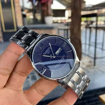 ساعة Tissot Stainless Steel Day-Date لون سيلفر ومطعم ميناء اسود وابيض