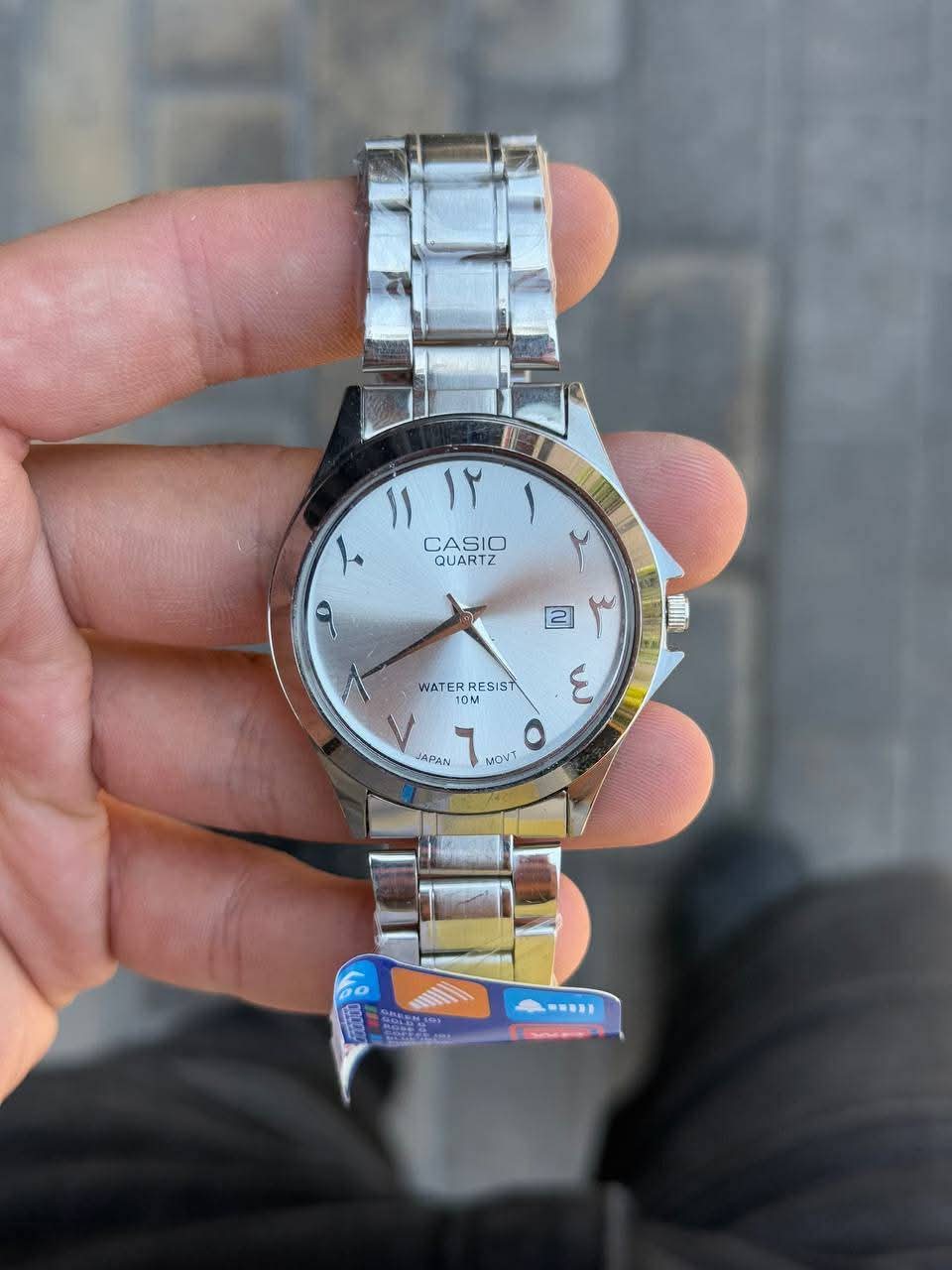 ساعة Casio Men’s Watch – Arabic Numerals  لون سيلفر_مطعم ميناء سيلفر _اسود_جولد