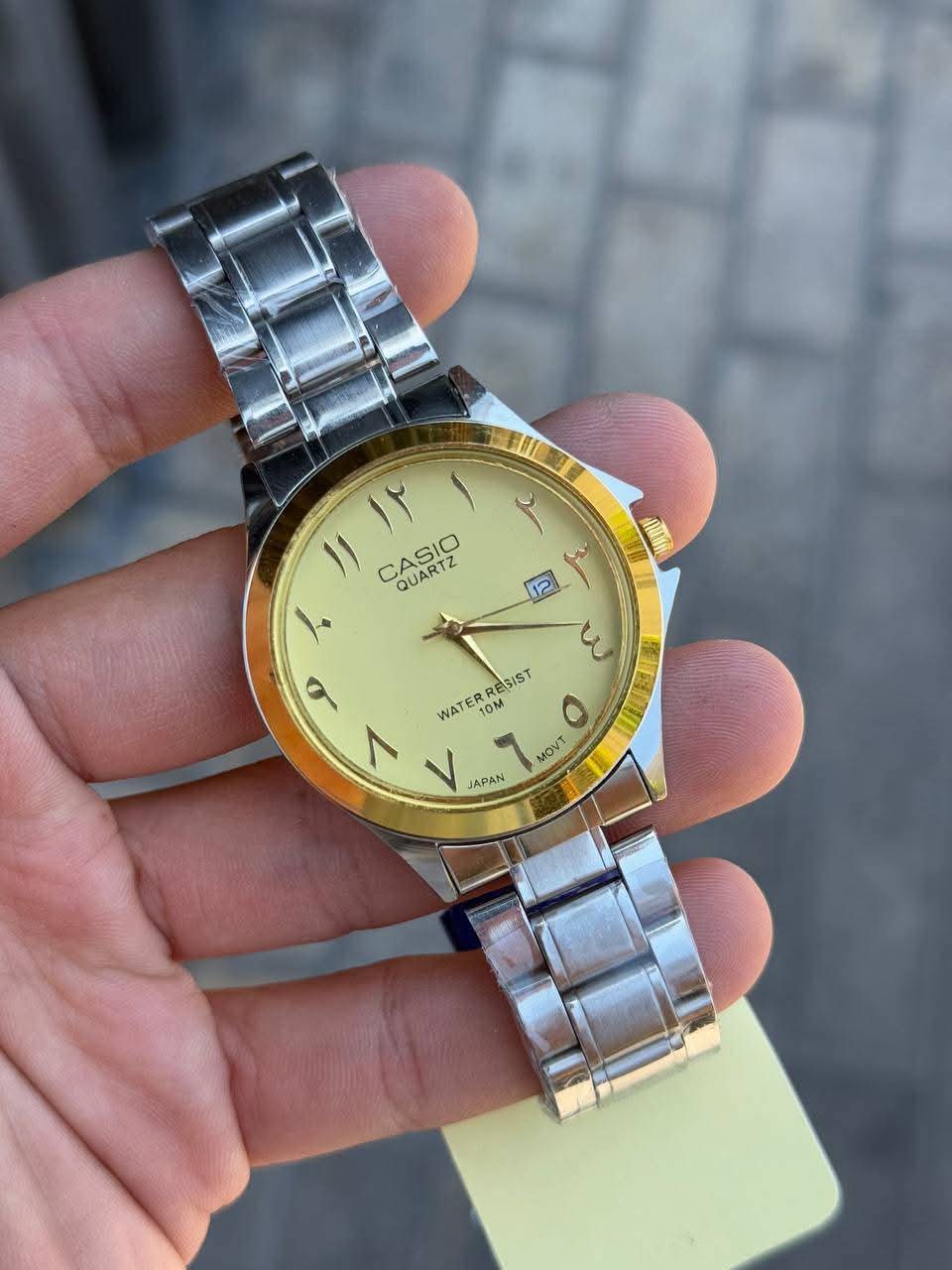 ساعة Casio Men’s Watch – Arabic Numerals  لون سيلفر_مطعم ميناء سيلفر _اسود_جولد