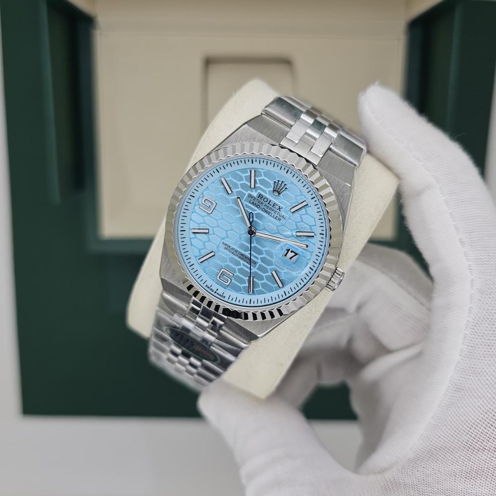 ساعة Rolex-Style Land Dollar Silver لون سيلفر مينا ابيض وسماوي _حركة سحاب ظهر شفاف