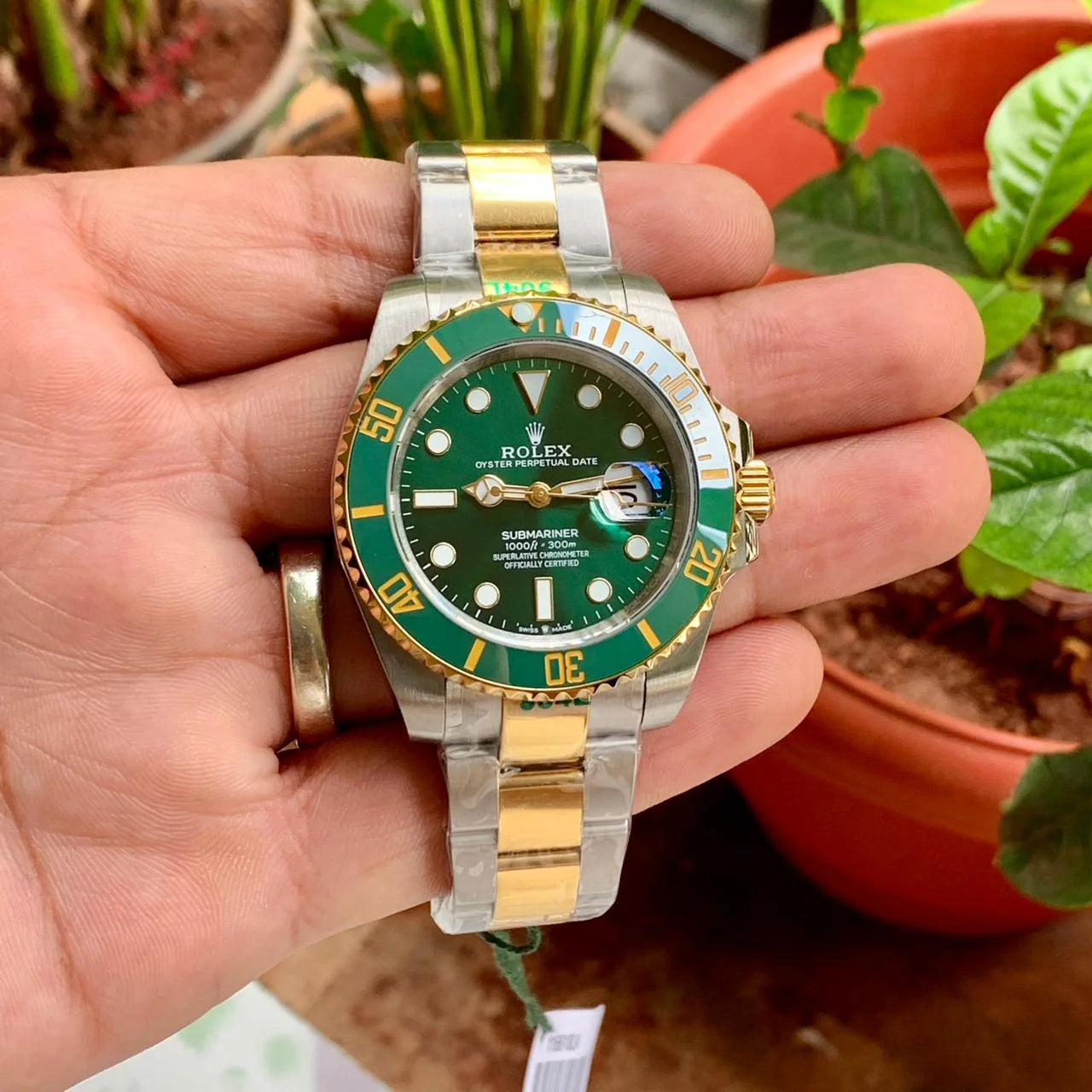 ساعة Rolex Submariner سيلفر في جولد ميناء اخضر