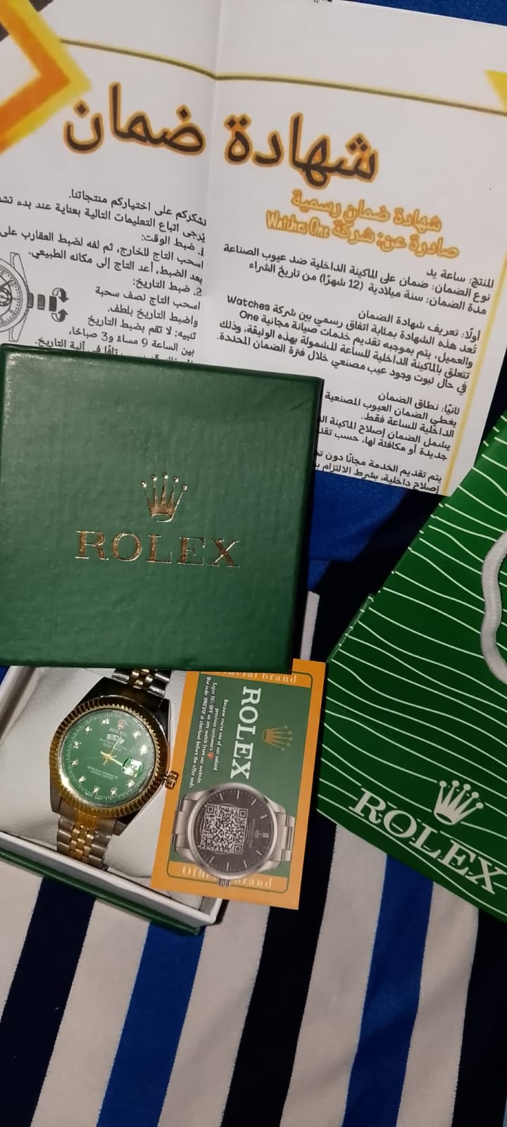 ساعة Rolex Oyster Day-Date بها 2 نتيجة اوستيك سيلفر في جولد ميناء اخضر