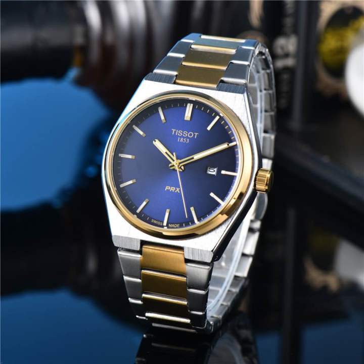 ساعة Tissot PRX Two-Tone Watch – Green / Blue Dial with Date مطعم لون ميناء اخضر وازرق 