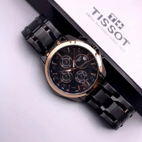 ساعة Tissot Chronograph Watch – Black Dial, Rose Gold Bezel & Black Metal Bracelet لون اسود اطار روز جولد عدادات تعمل 