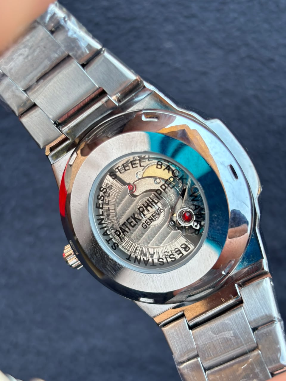 ساعة Patek Philippe Silver Watch – White Dial, Date Display & Transparent Case Back